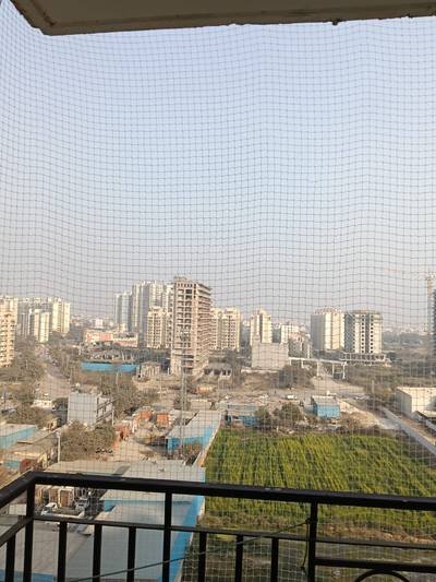 Balcony safety net fitted across an open terrace edge